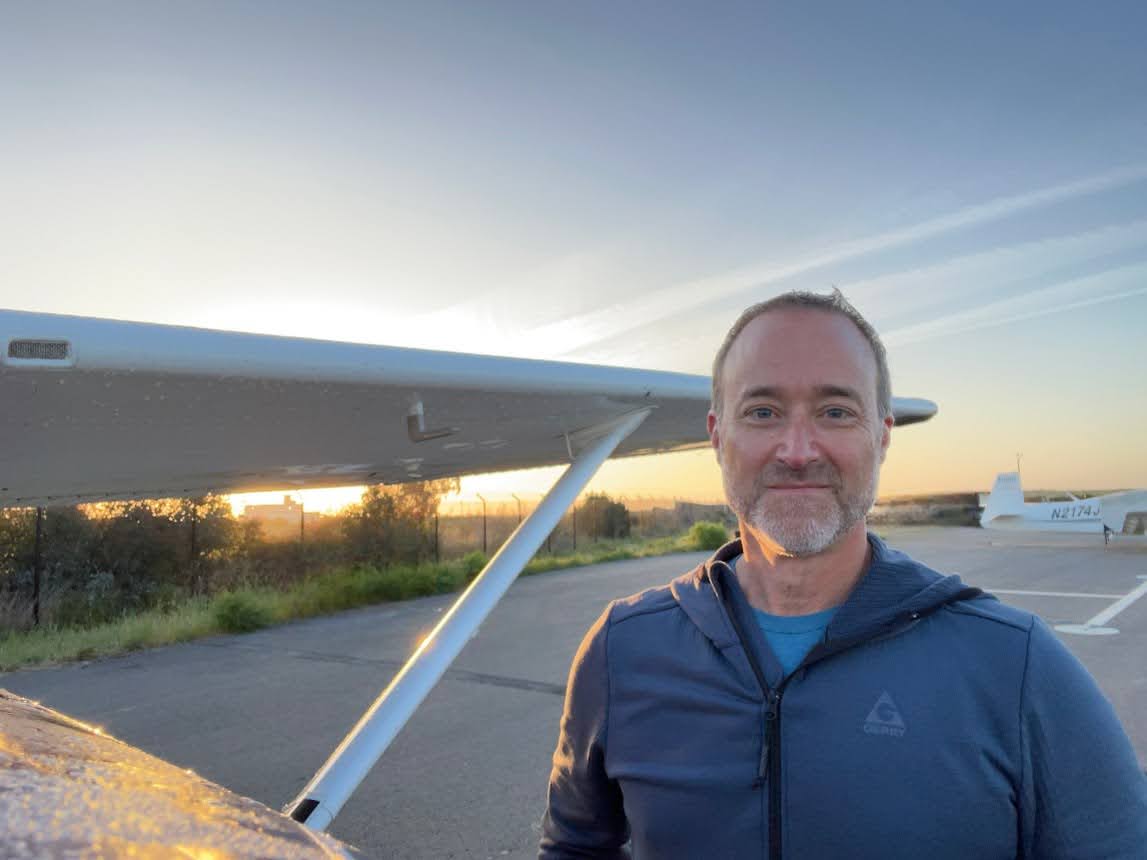 Peter Monaco standing by a Cessna 172