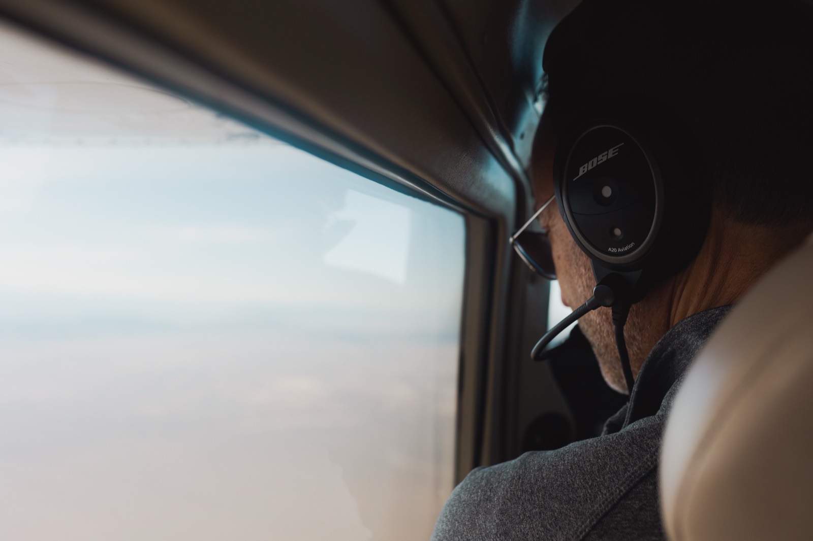 Peter Monaco, CFI, looking out the window, in flight