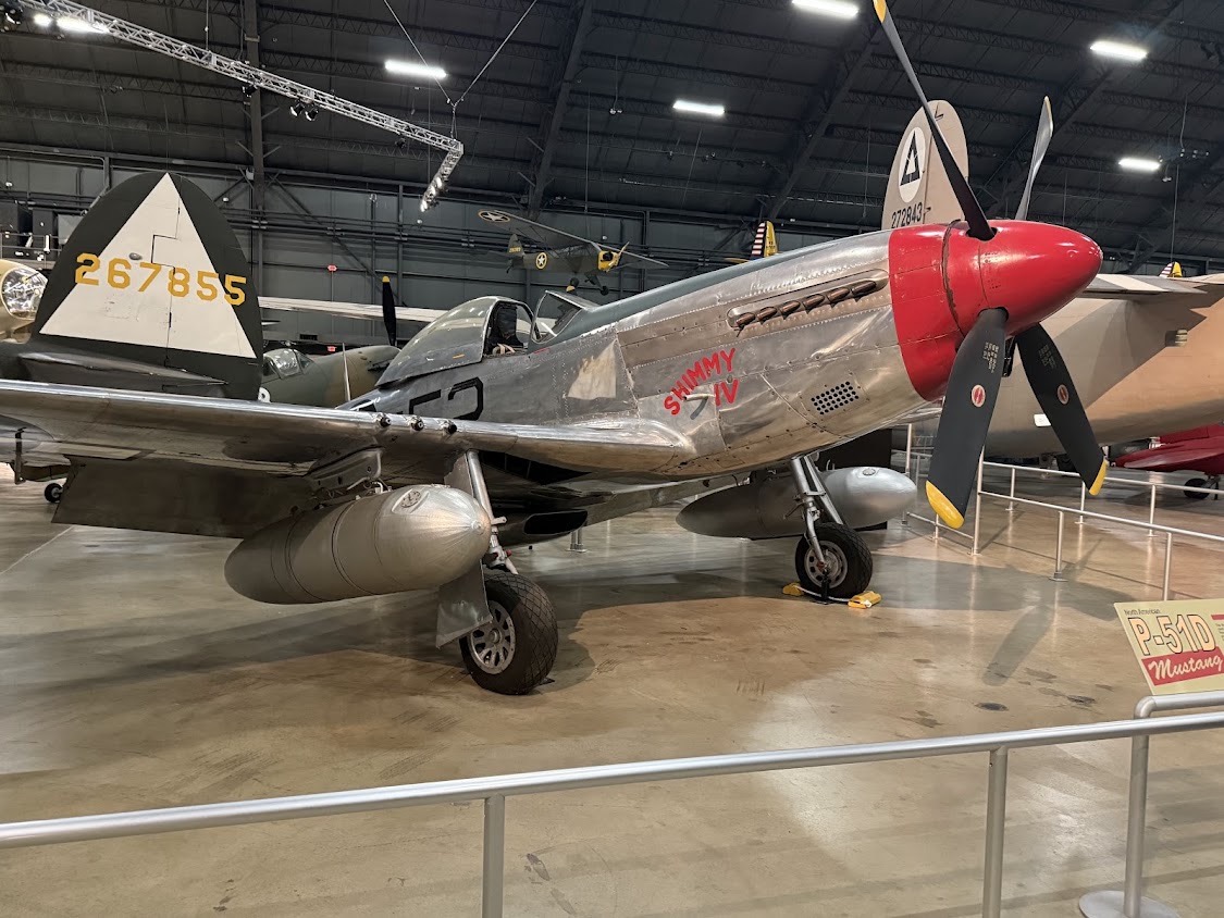 A polished P-51D Mustang on display at the National Museum of the U.S. Air Force