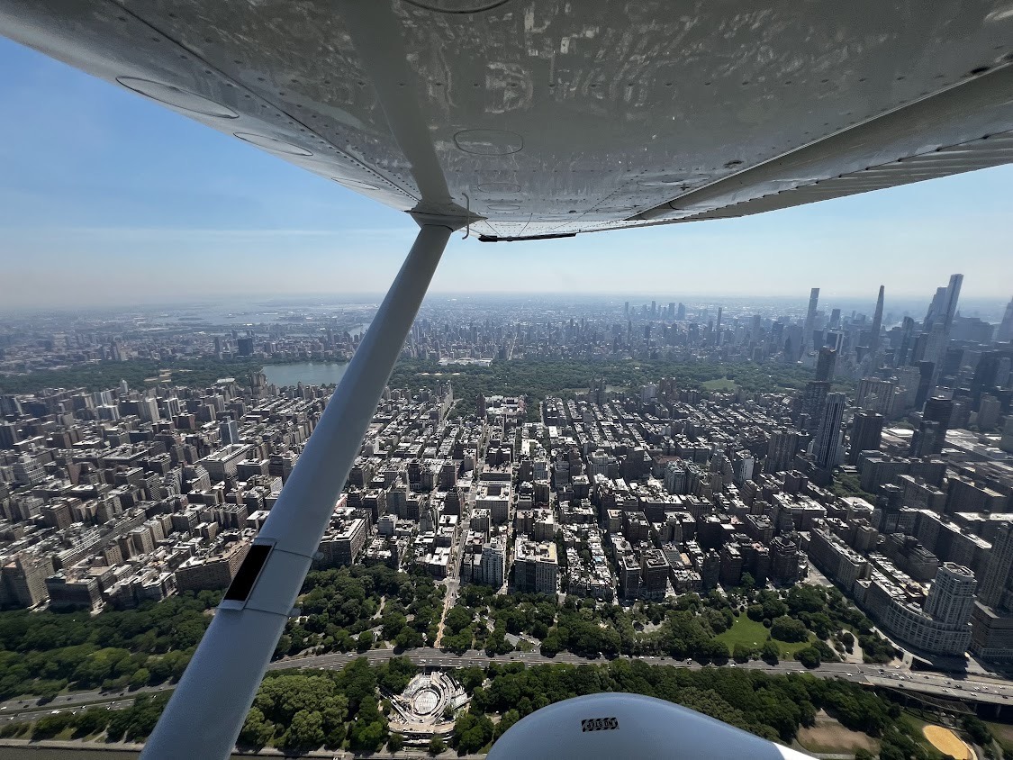 Central Park and the Manhattan skyline, seen under the wing of a Cessna